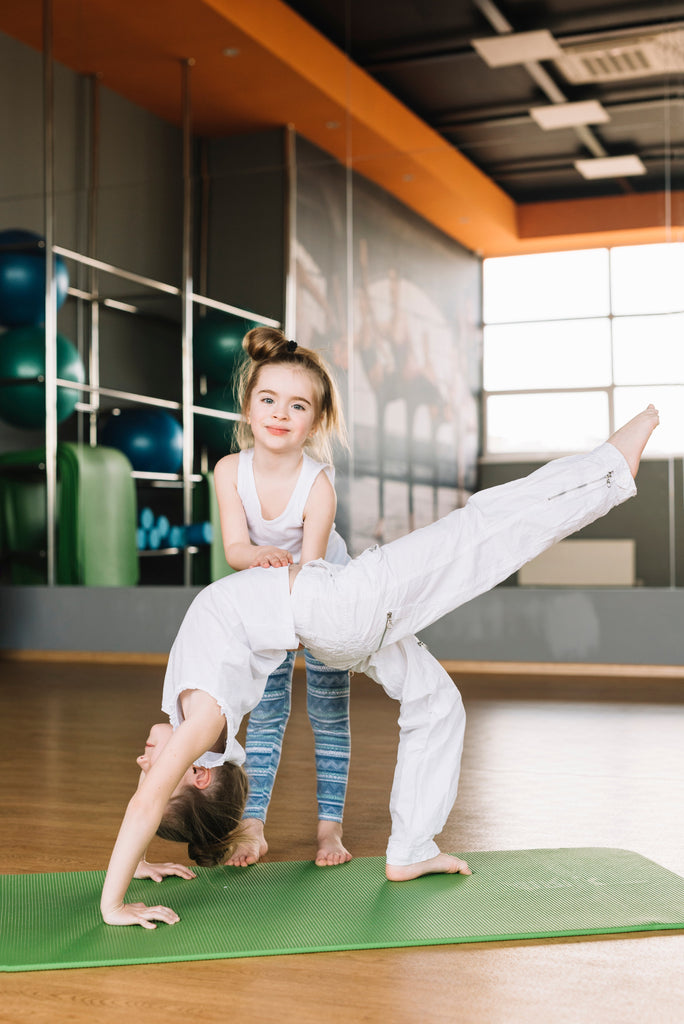 Two people yoga poses for kids